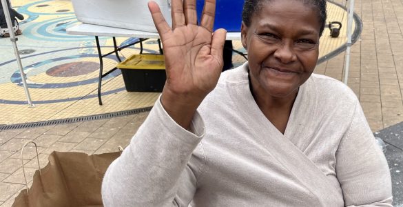 Elaine Coleman, an unhoused DC resident, visits the farmers market.